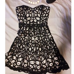 Black and gold strapless cocktail dress